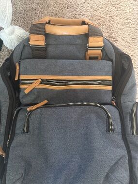 Tumi Blue-Gray Travel Backpack with Tan Leather Accents
